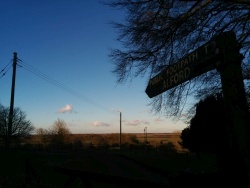 Alford footpath sign sunset